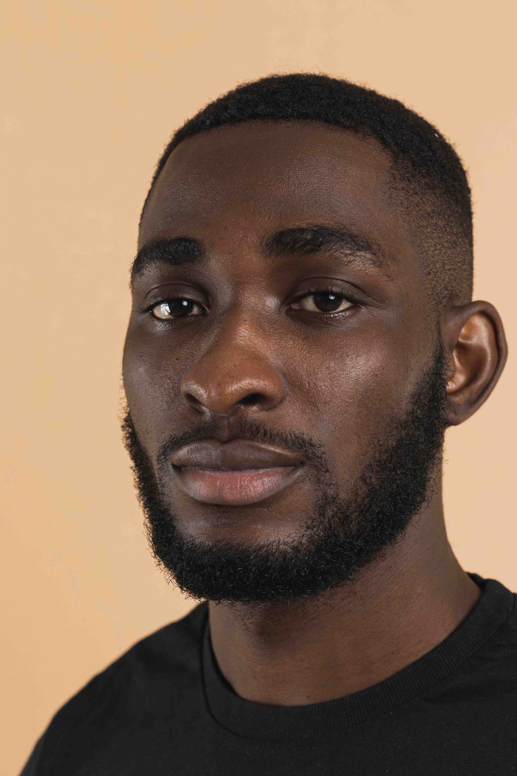 Professional close-up portrait of a Wastol Express team member, representing reliable and expert pet logistics services in Nigeria.